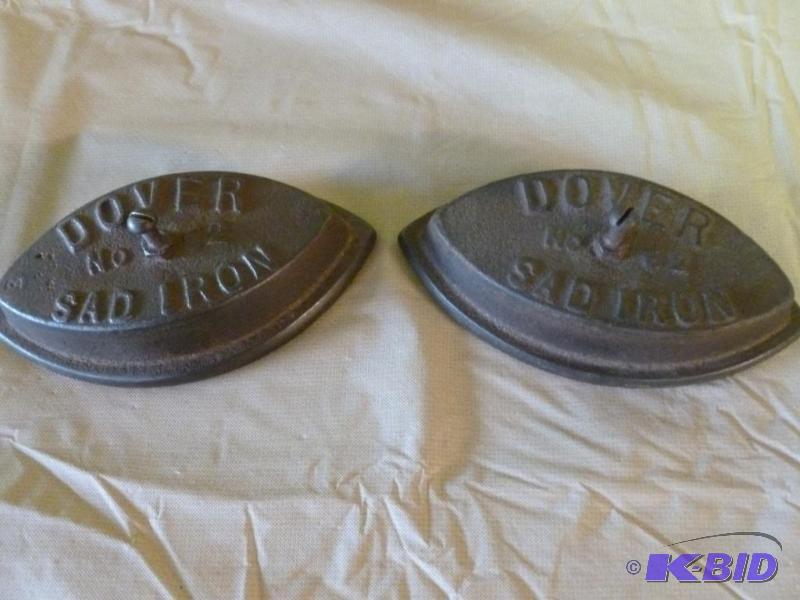 lot 82 image: Lot of two antique cast iron Dover Sad Irons...