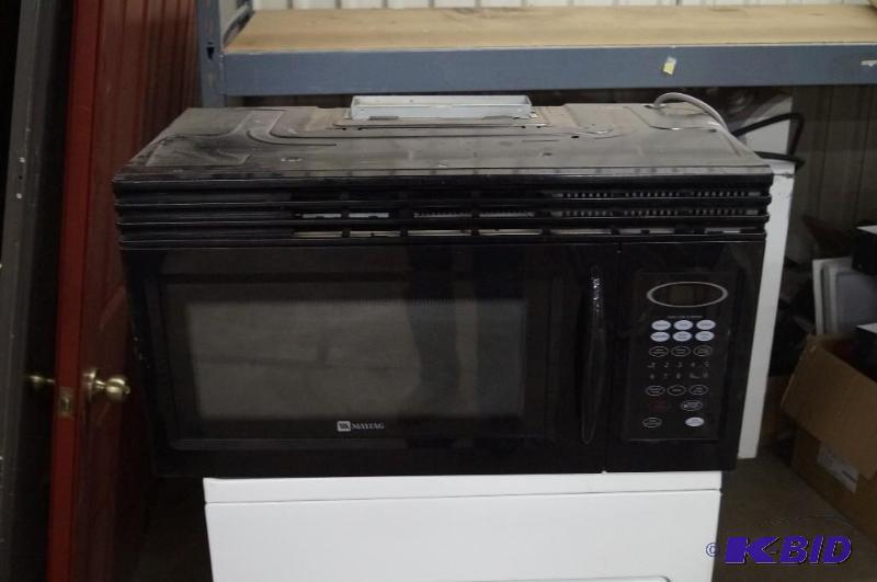 lot 9 image: Maytag microwave oven over the stove