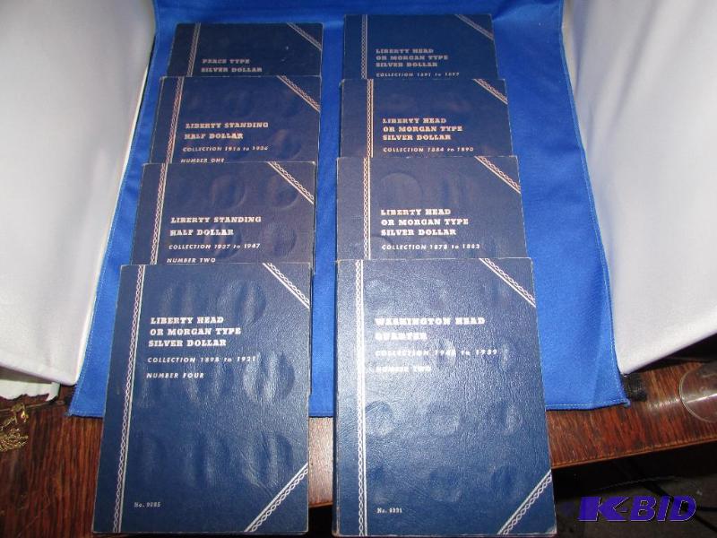 8 empty coin books...