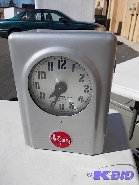 lot 34 image: Montgomery&nbspVintage Looking Clock...