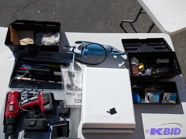 lot 85 image: Tool Shop Cordless Drill With Battery & C...