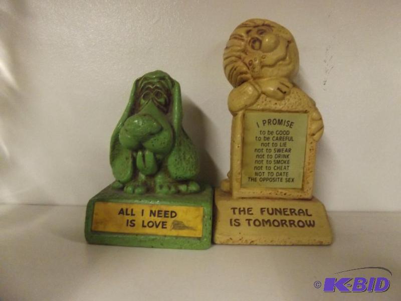 Two figurines with sayings...