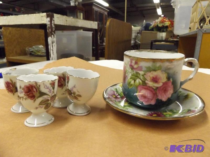 set of 4 egg cups, cup and saucer, does not m...