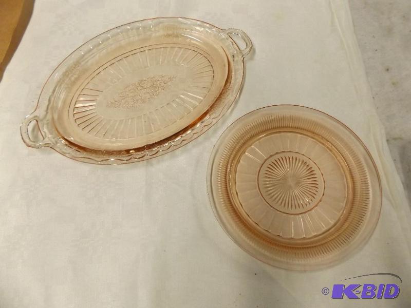 Two pink depression glass serving plates...