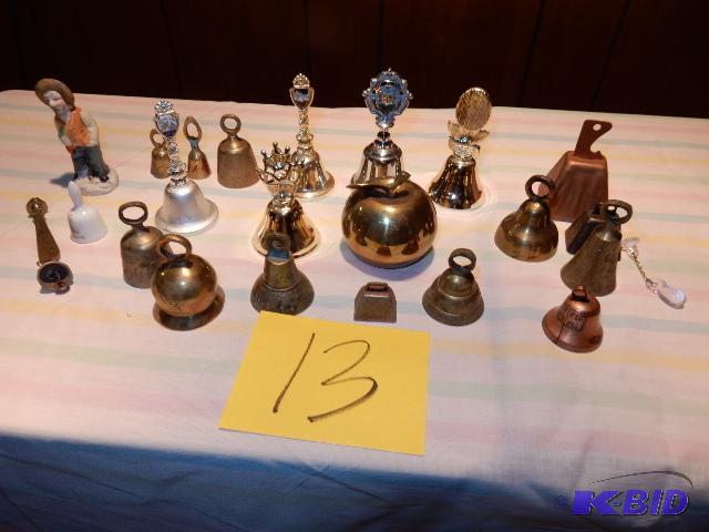 lot 13 image: Misc. Brass and metal bells.. see the pop can...