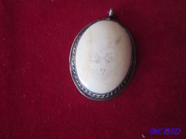 Vintage white stone with etched cat face and ...