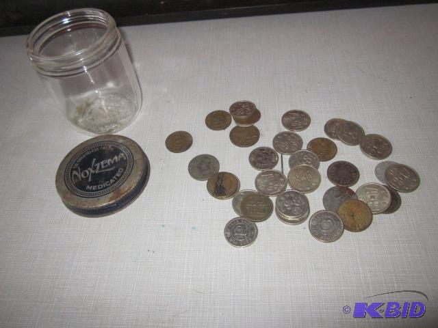 Lot of vintage tokens in old jar.&nbsp...