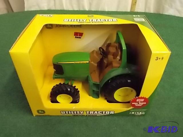 lot 11 image: JD Ert Utility Tractor...