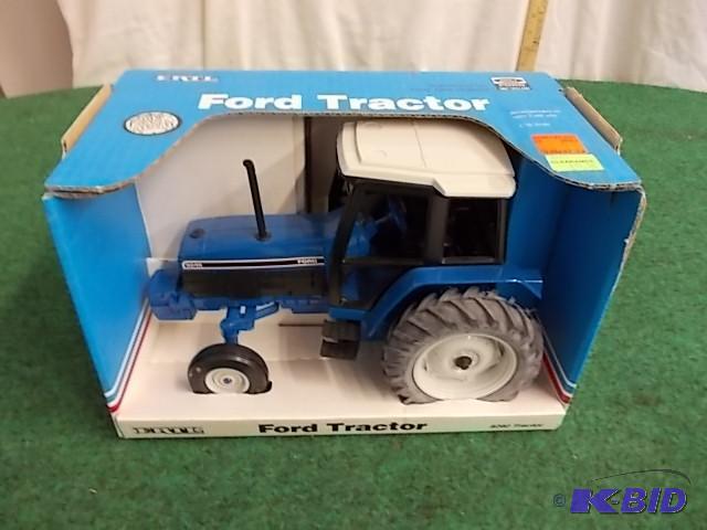 lot 63 image: Ertl 116 Ford Tractor Model 8240...