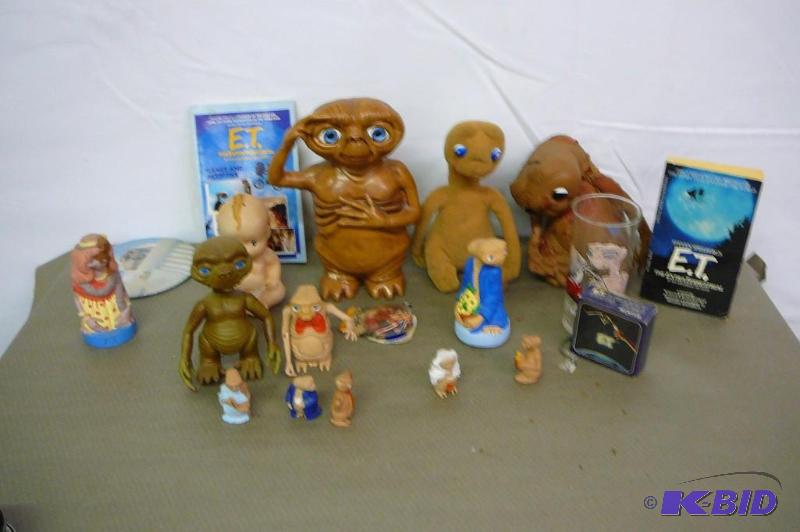 E.T stuff Books, buttons, figurines ect.&nbsp...