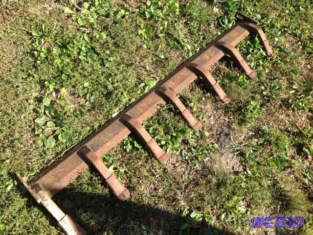 lot 13 image: Bolt on cutting  digging teeth for bobcat skid loader tractor bucket. 5.5 wide.