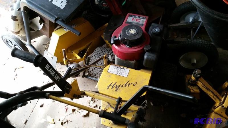 lot 21 image: Hydro bed edger, similar to brown bed edger, but is hydraulically powered.