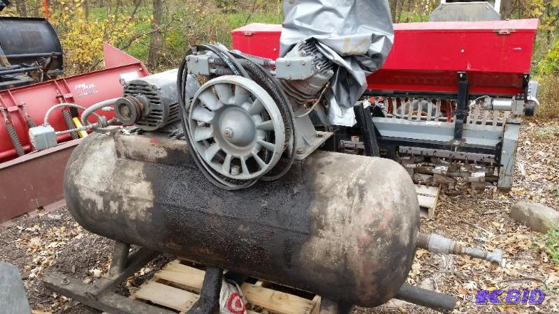 lot 23 image: Large 120 gal air compressor newer pump and belts.
