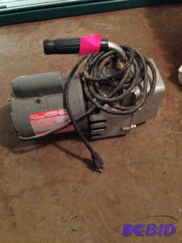 lot 11 image: Dayton Vacuum pump...