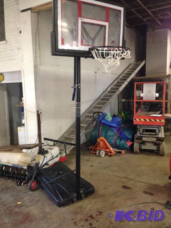 lot 37 image: B Ball Hoop with base 10 approx Tall...