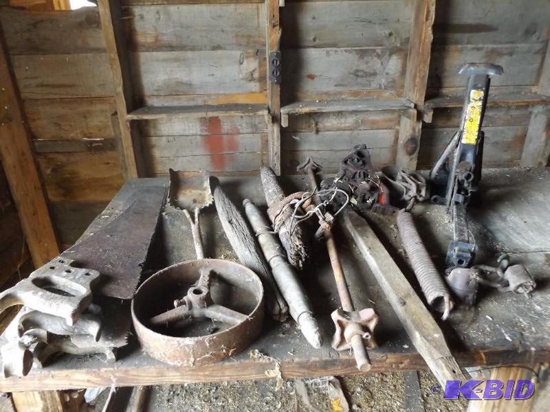Misc tools, hand saws, belt wheel, spring...