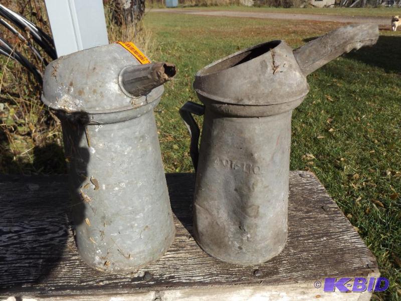 two oil cans...