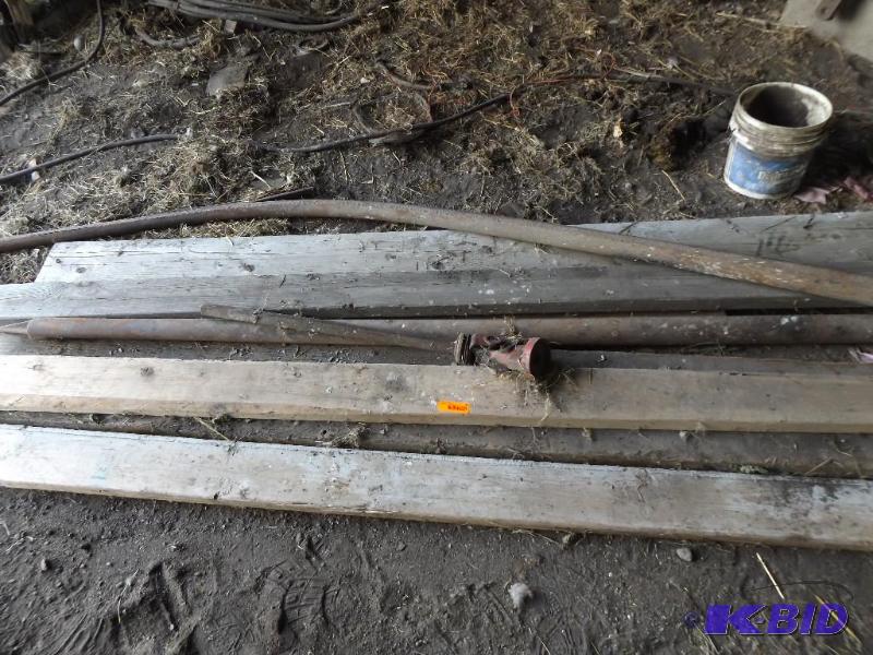 misc old lumber and old pipe, PTO shaft...