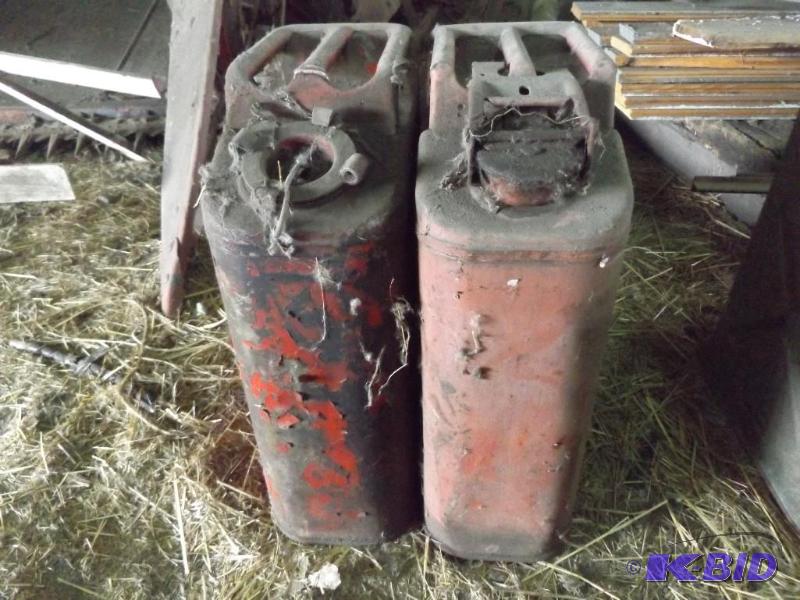 Two metal gas cans...
