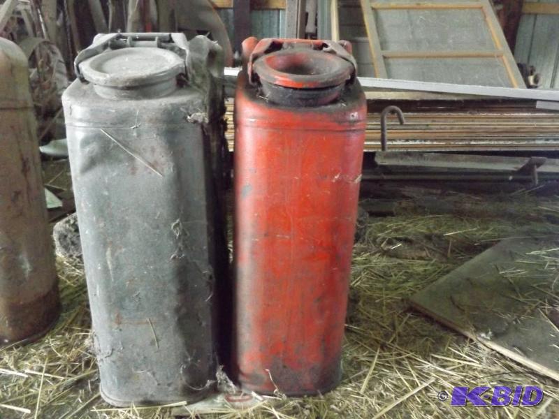 Two metal gas cans...
