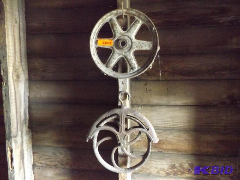 Two Antique metal pulleys...