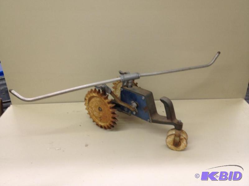 lot 117 image: Cast Iron Tractor Lawn Sprinkler...
