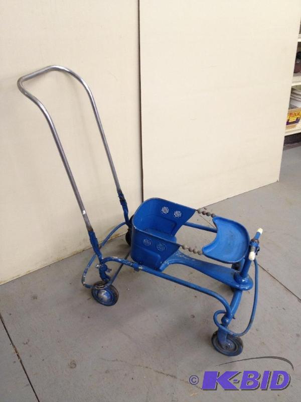 lot 46 image: Antique Baby Walker made of Tin and Hardwood&...