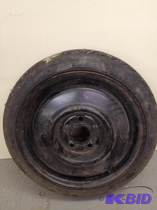 lot 60 image: Spare 14 Tire