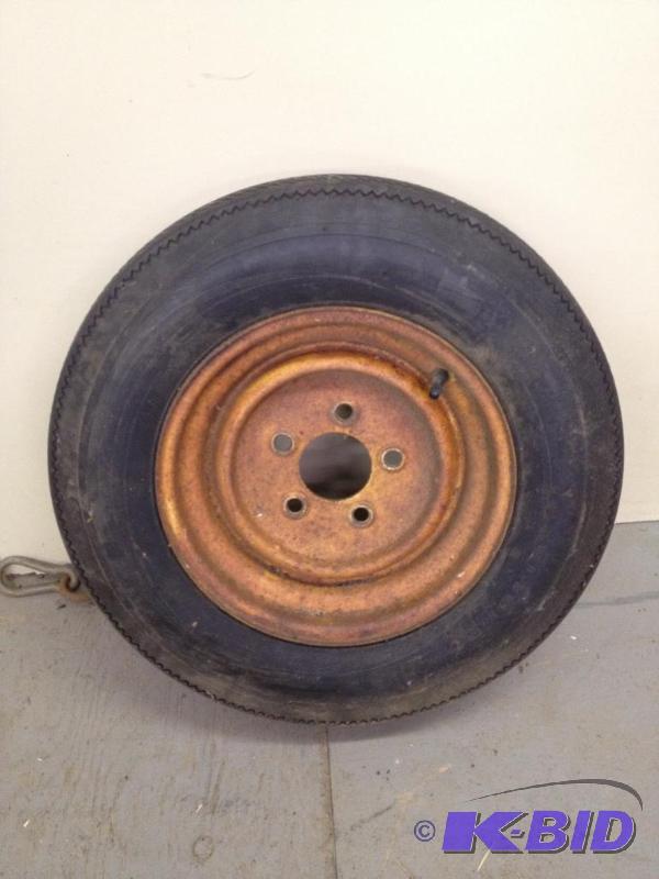 lot 61 image: 5.30-12 Tire on Wheel