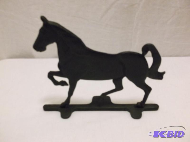 lot 40 image: Heavy cast iron horse door stop measuring 12&...