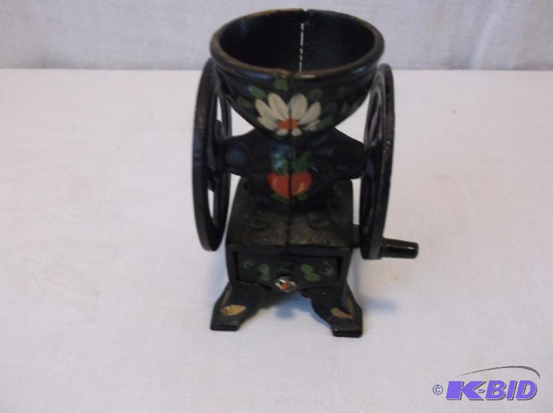 lot 55 image: Cast iron hand painted spice grinder in great...