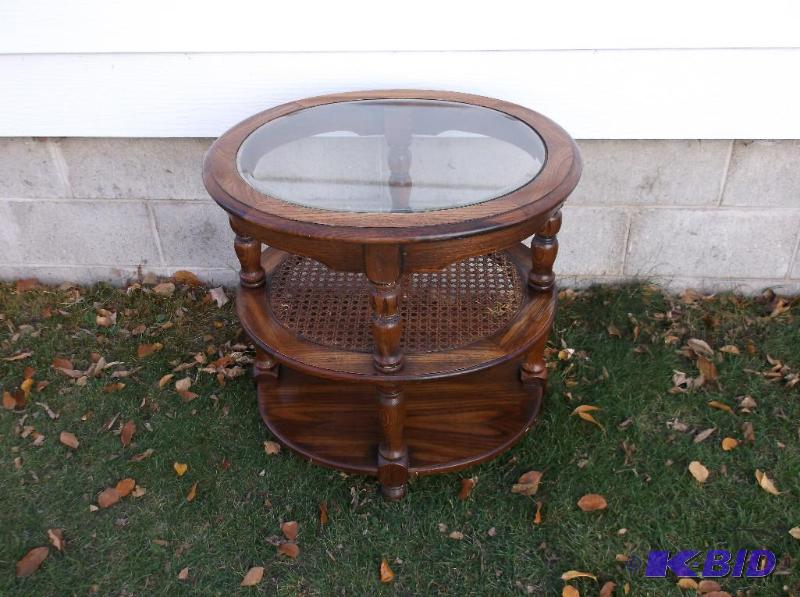 lot 8 image: Oval oak beveled glass 2 shelf end table meas...