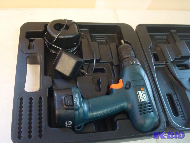 lot 32 image: Black And Decker Power Drill With Battery and...