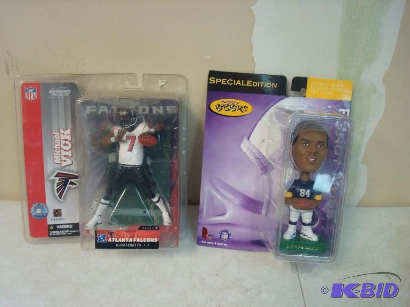 lot 56 image: New Vick And Moss Bobbleheads...