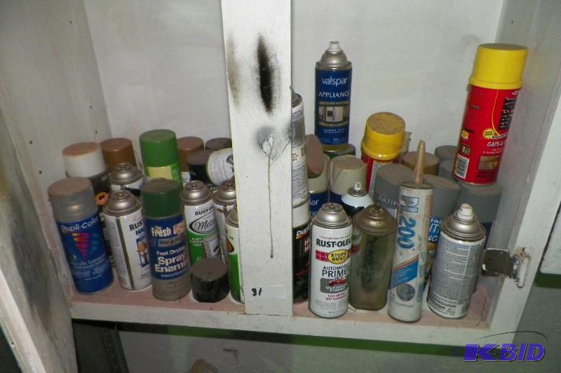 paint cans on shelf