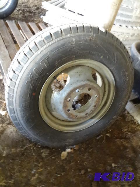 lot 312 image: LT22575R16 Tire with Chevy 1 ton DRW Rim, Ti...