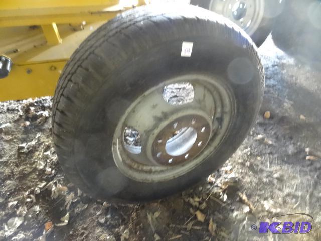 lot 313 image: LT22575R16 Tire with Chevy 1 ton DRW Rim, Ti...