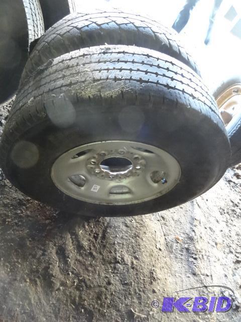 lot 315 image: 2 Lt24575R16 tires on Chevy 1 ton SRW Rims...