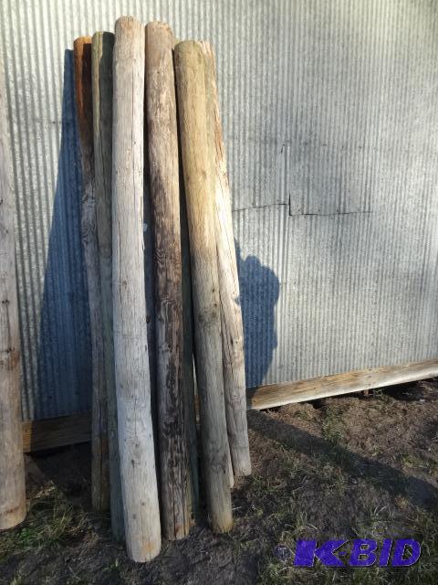 lot 318 image: 84" wood Fence Post Poles. Qty 10...