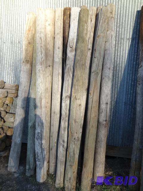 lot 319 image: 84" wood Fence Post Poles. Qty 13...