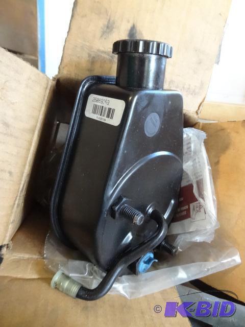 lot 40 image: New GM # 26060551 power steering pump....