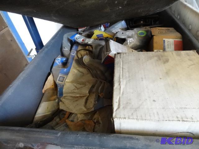 lot 51 image: Bin Full of GM parts. Truck and vans. 5.7, 6....