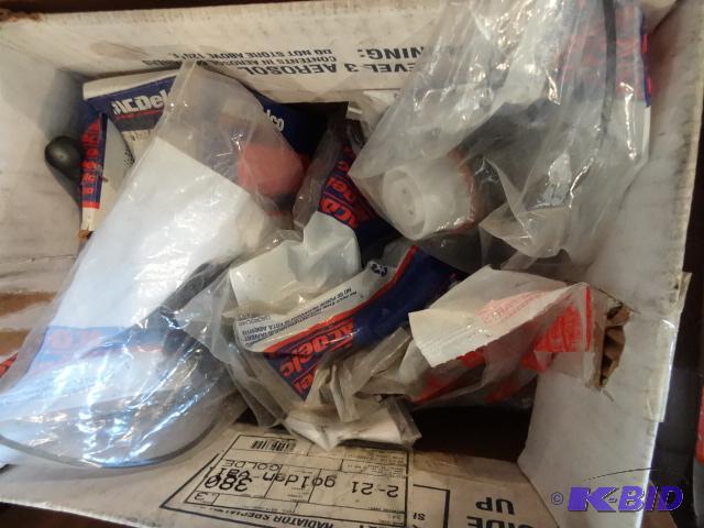 lot 71 image: GM Gas Caps 25820825. Qty 5 Isuzu gas caps...