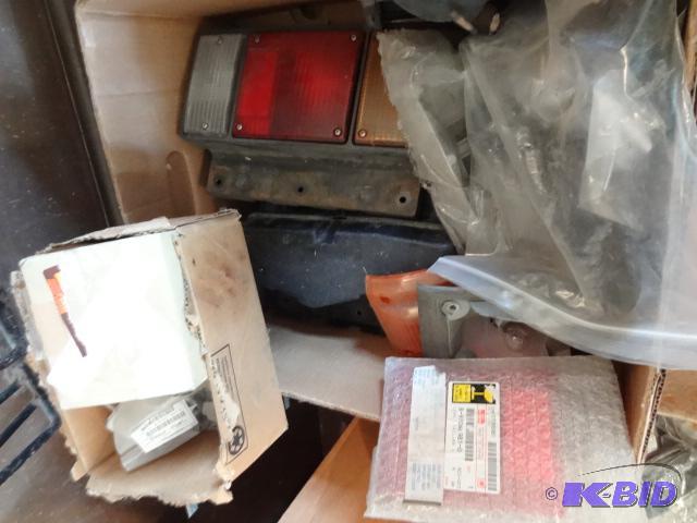 lot 77 image: Box of Misc New and Used Isuzu Truck Parts...