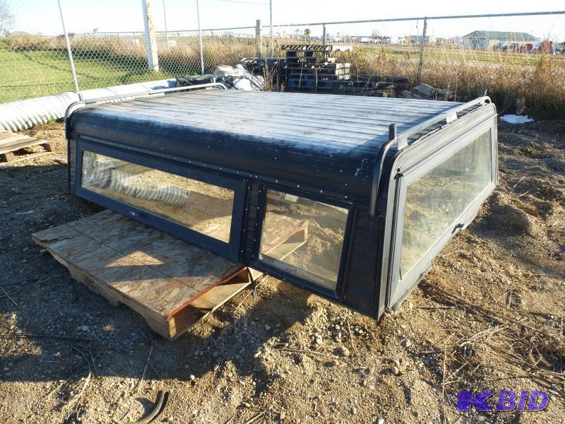 Aluminum Topper 8 long box. Side entry door...