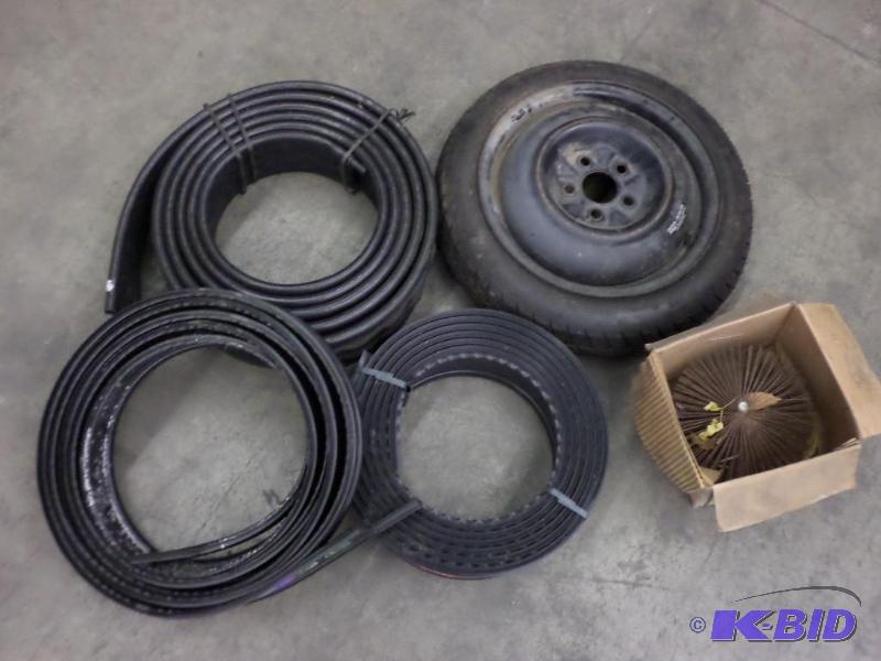 lot 14 image: Lot Of (1) Spare Tire, (1) Chimney Sweeper, ...
