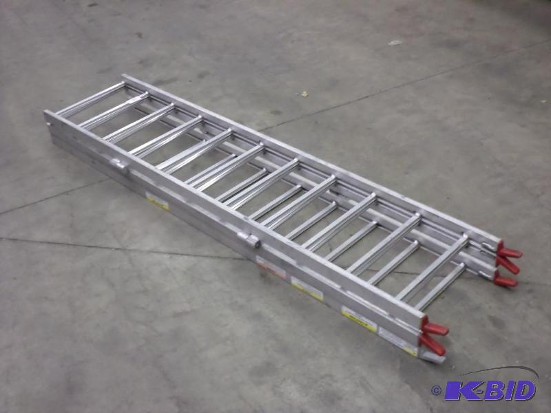 lot 28 image: Tri-Fold Aluminum 6ft Utility Ramps...