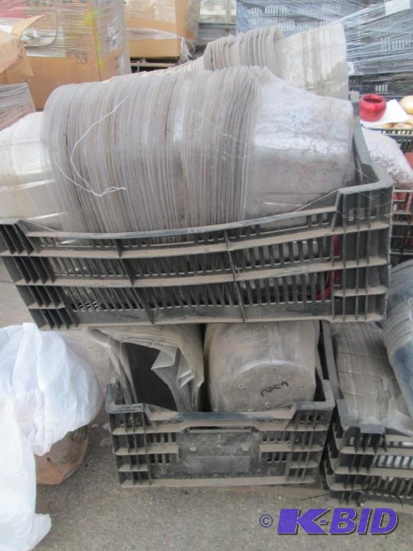 lot 31 image: Oblong Planter Liners, 2 Plastic Pots, and 2 Poinsettia Vases