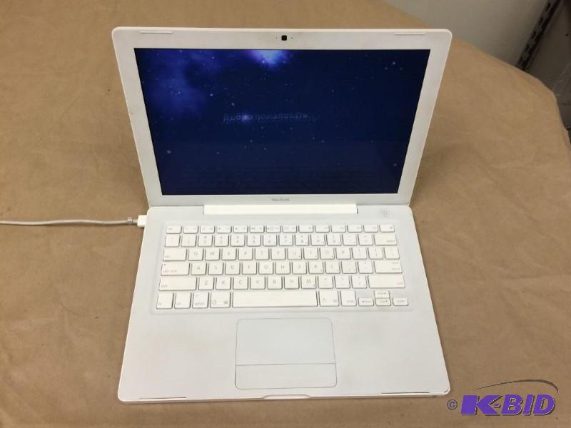 lot 1 image: Apple MacBook MA254LLA Personal Laptop Runs...