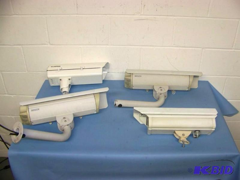 lot 31 image: (4) CCTV  Security  Surveillance Cameras in metal housing